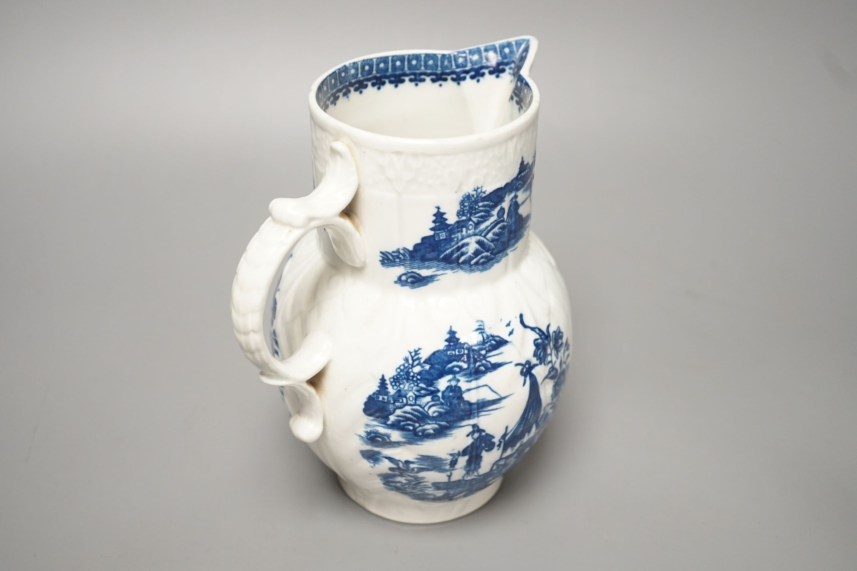 A Caughley mask jug printed with Fisherman pattern, c.1785, S mark, height 19cm